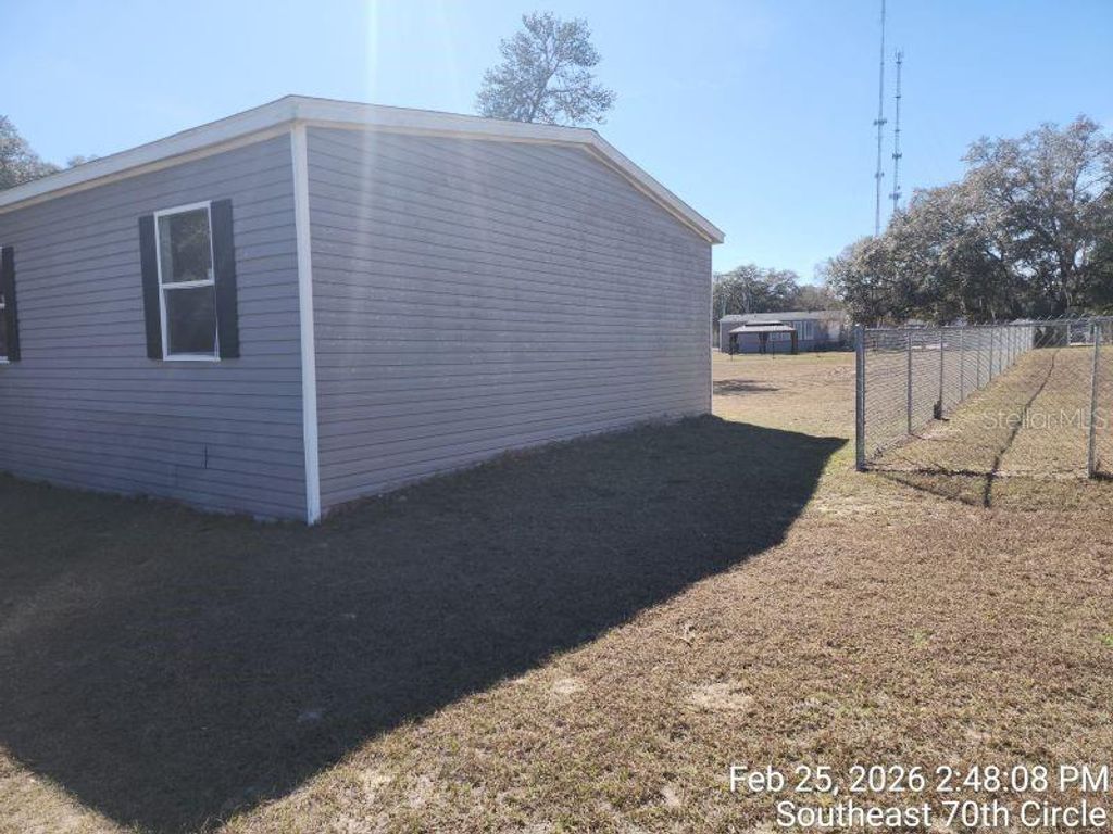 Photo of 213 SE 70th Circle, Ocala, FL 34472 (MLS # OM720620)