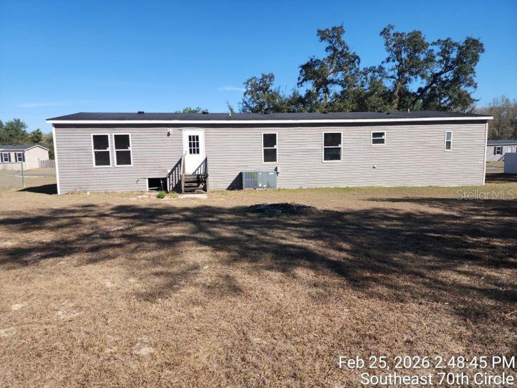 Photo of 213 SE 70th Circle, Ocala, FL 34472 (MLS # OM720620)