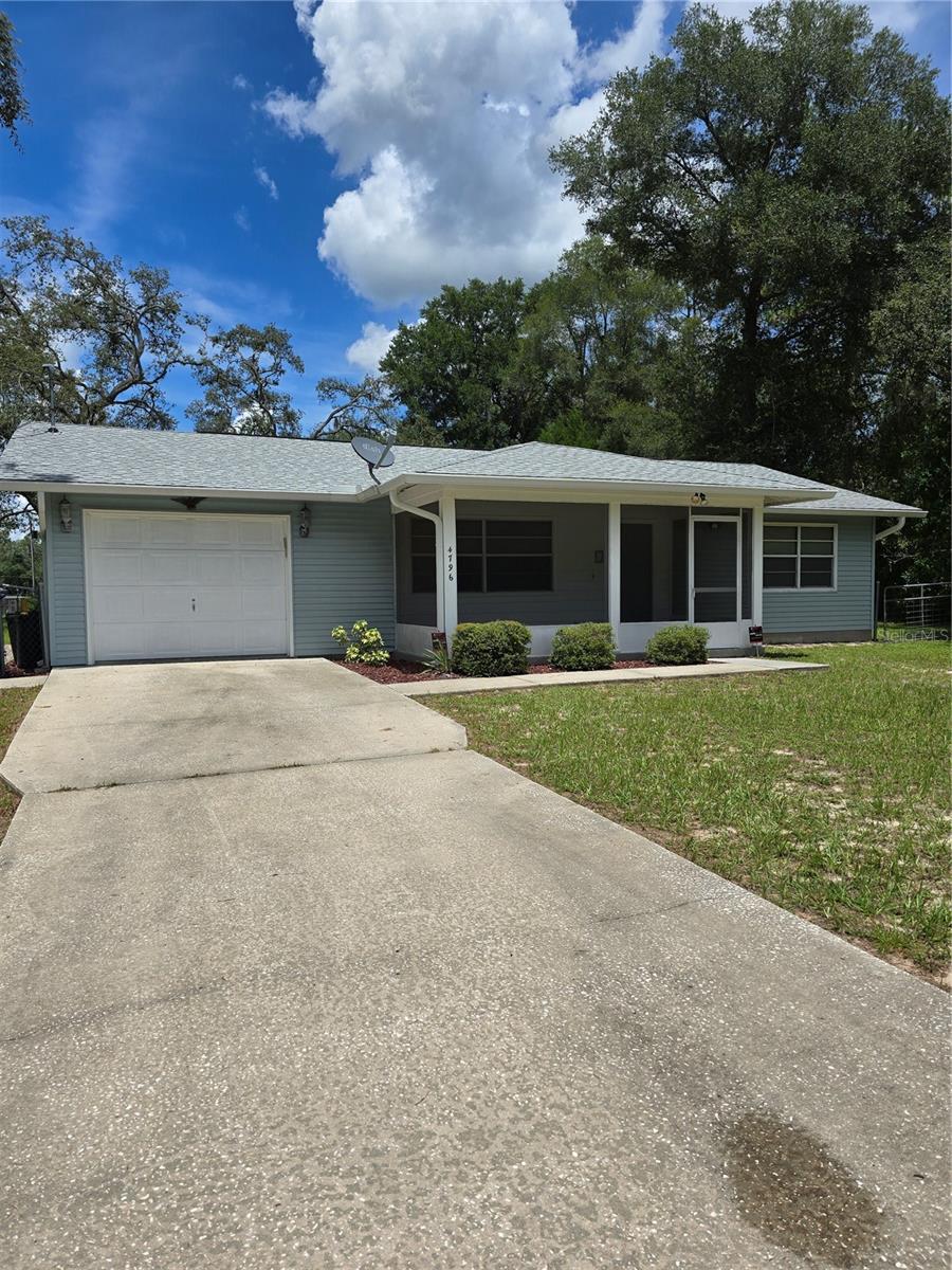 Come and see this cozy 2-bedroom 2 bath home. Has large fenced in back yard with storage shed, and owner has included a John Deer lawn mower (20220 that looks like new. The home has a one car garage that is spotless. The water heater, water softener system, washer and dryer are located in the garage. When you walk into the home you will notice the ceramic tile throughout. The bedrooms have carpet. The open dining and kitchen have lots of natural sunlight from the sliding door unite that leads to the back screened porch. The kitchen has lots of cabinet and counter space, with new appliances. The living room has good space for entertaining. The main bathroom was just remodeled with new fixtures and a new walk-in shower. The second bedroom has nice walk-in closet. The master bedroom has large wilk-in closet and full bath with tub/shower. The home has been completely repainted. There is also a screen porch on the front of the home. Both porches have all new screen on them. This home also has a security system. If you are looking for a cozy home with a country setting this could be your answer. Call today to set up an appointment to see this home.