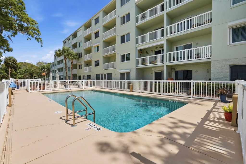 Photo of 711 N Halifax Avenue #101, Daytona Beach, FL 32118 (MLS # FC316981)