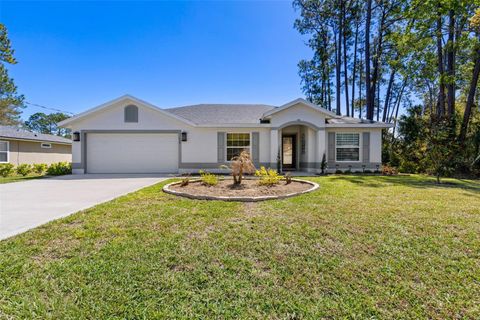 Photo of 114 Brunswick Lane, Palm Coast, FL 32137 (MLS # FC317045)