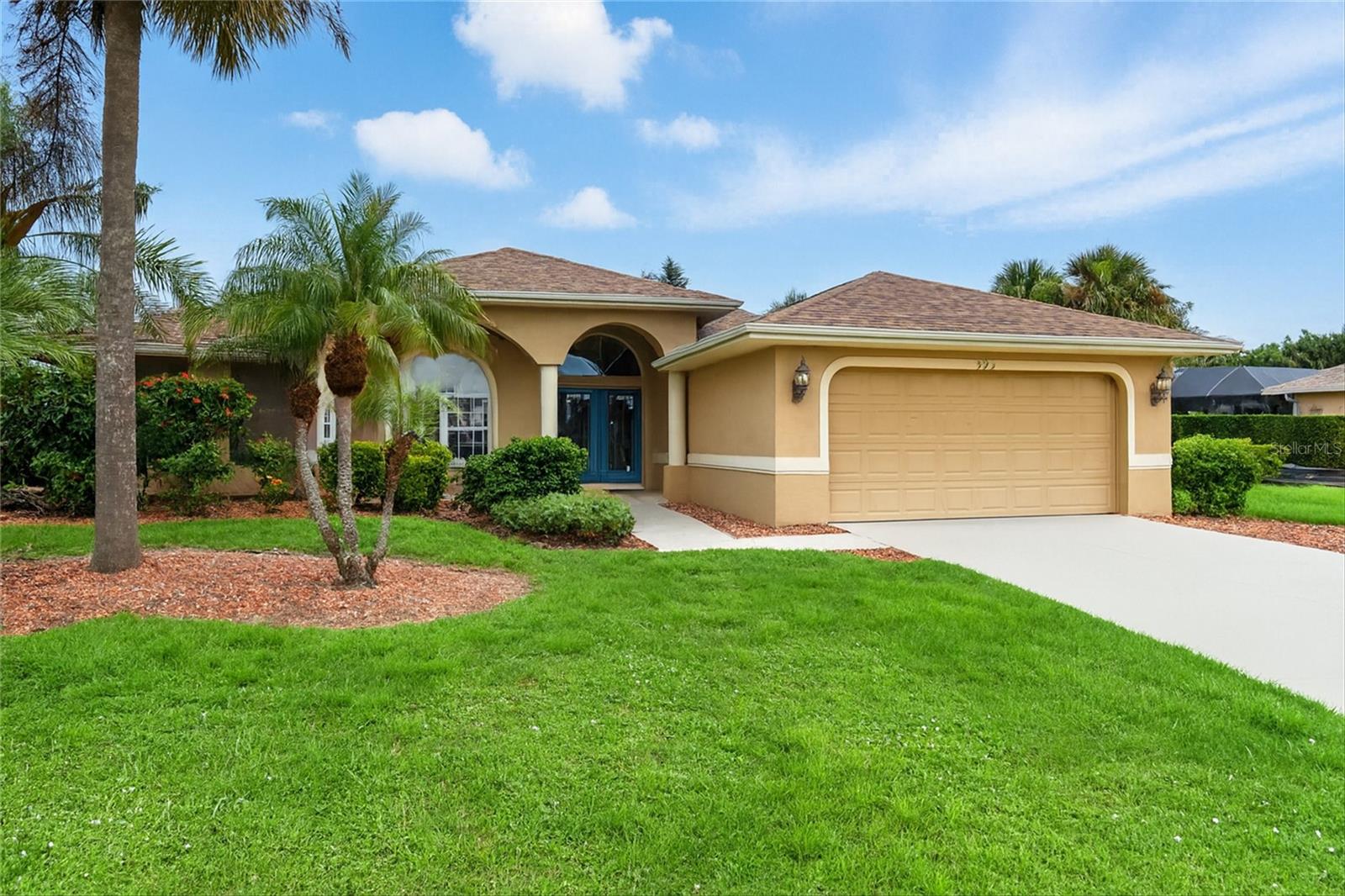 Located in charming Punta Gorda this beautiful ideal custom home in the desirable community of Burnt Store Meadows is less than 5 miles from downtown featuring boutique restaurants, farmers markets and unique craft & food festivals. The community has streetlights throughout, a main sidewalk for strolling or dog walking and city water and sewer. This home is positioned on an oversized, almost half acre lot. A lovely green belt is located behind the lot providing spacious views. As you enter, you will love the open floor plan with vaulted ceilings and the stunning view of the custom pool through the living room pocket glass sliders. The large master suite features sliding glass doors to the lanai and pool area, two walk-in closets, double sink vanities, walk-in shower and a soaker bathtub. The kitchen has a breakfast nook area with windows overlooking the lanai. The home offers a split bedroom floor plan with the master suite and guest bedrooms on opposite sides and a two-car garage. The screened pool enclosure surrounds a large lanai with cabana bath and custom pool. Extras include direct electrical panel connection for a generator, custom window shades throughout, hurricane shutters for covered lanai and all windows, custom light fixtures and fans and a new shingle roof only two years old.