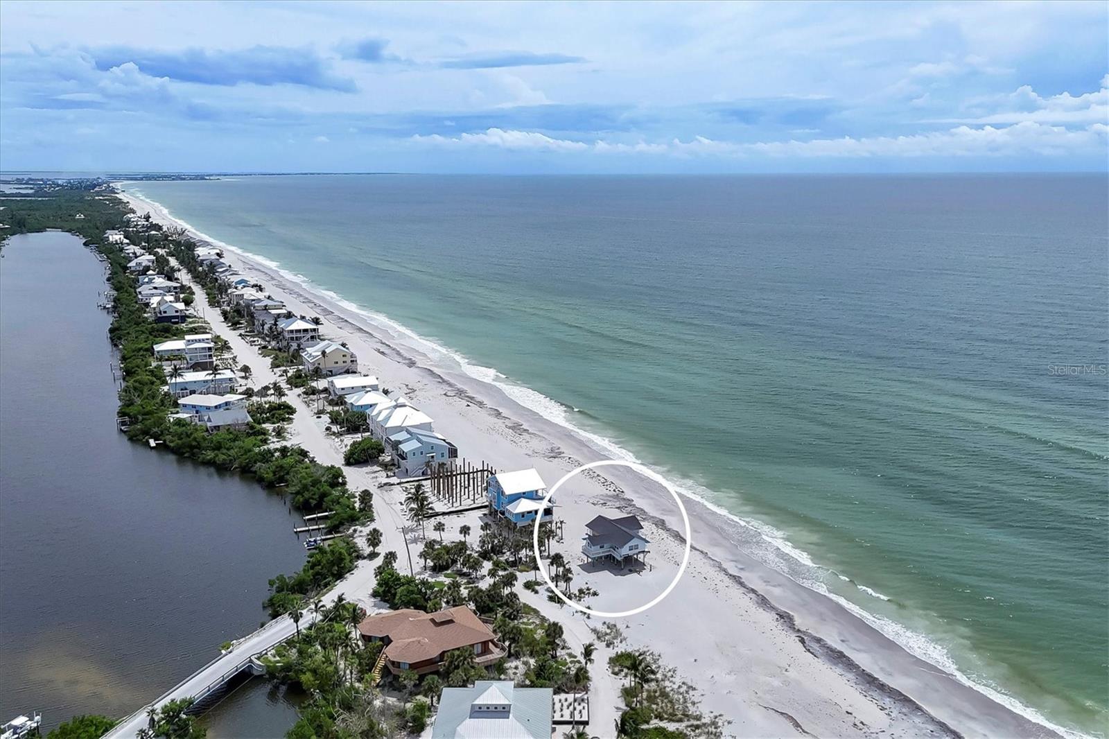Gulf-to-Bay Opportunity on Don Pedro Island – Priced at Lot Value!
Discover a rare Gulf-to-Bay property on the exclusive Don Pedro Island, a bridgeless barrier island nestled between Sarasota and Fort Myers. Accessible only by a short car ferry ride, this serene location offers the ultimate escape—where quiet beaches, unspoiled nature, and laid-back island living define your everyday.
This unique property offers the best of both worlds: beachfront living on the Gulf of Mexico and a boater’s paradise on the bay side, with just two bridges to the Intracoastal Waterway and Gulf access beyond.
The home sustained damage during the 2024 summer hurricanes and will require repairs. There is currently no electricity to the structure, and stairs need to be rebuilt. Buyer is responsible for determining the extent of restoration required. This is a lot value sale, making it an incredible opportunity for someone with vision to build or restore in a one-of-a-kind location.
Whether you're looking to create a stunning new island retreat or restore a piece of Old Florida charm, this property is your chance to own a slice of paradise in one of the most peaceful and picturesque corners of Florida.