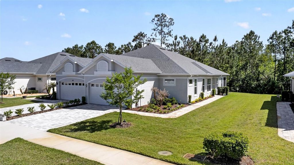Photo of 66 Wrendale Loop, Ormond Beach, FL 32174 (MLS # FC318199)