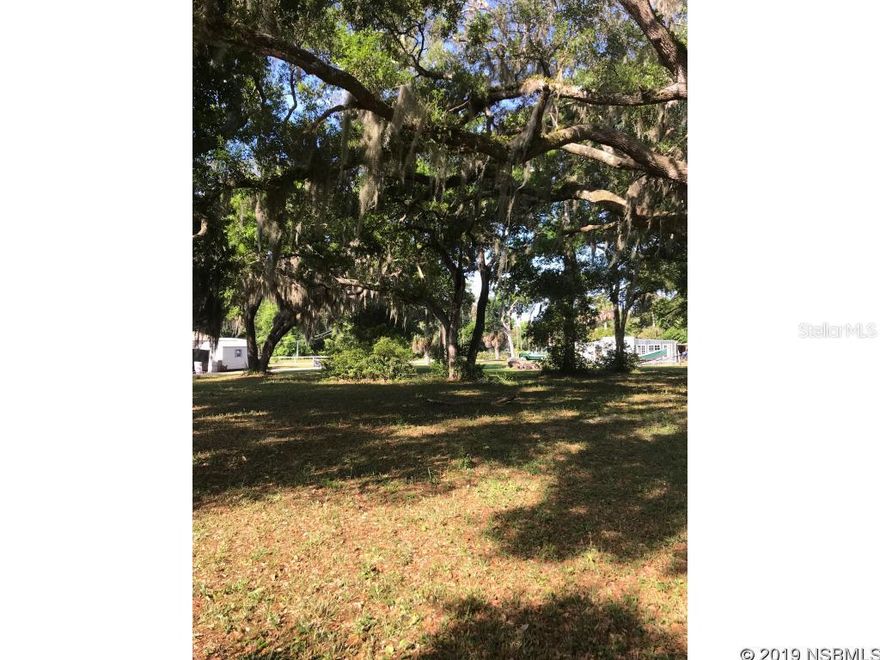 This beautiful corner lot is ready for you to build your dream home, almost a 1/2 acre with a few mature oaks mostly cleared and ready.  This lot is nestled in the community of Oak hill right outside the gorgeous beach town of New Smyrna Beach.  Seller financing available