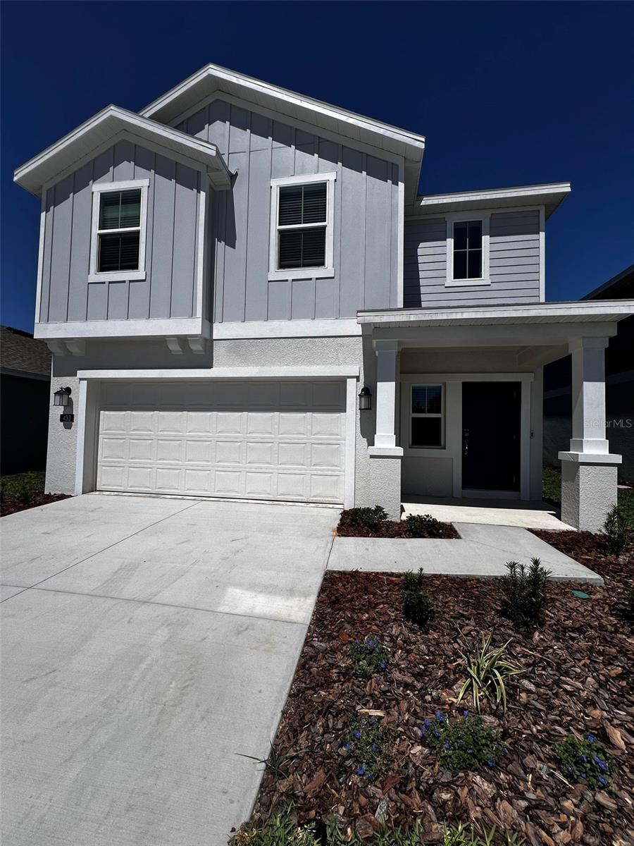 Photo of 433 Sandbar Lane, Haines City, FL 33844 (MLS # O6429617)