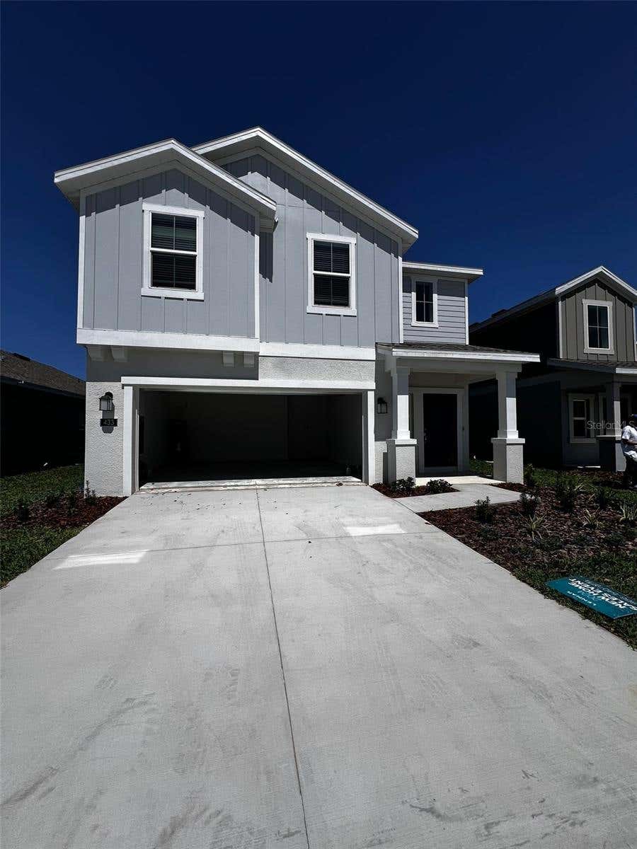 Photo of 433 Sandbar Lane, Haines City, FL 33844 (MLS # O6429617)