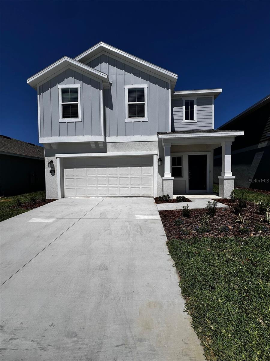 Photo of 433 Sandbar Lane, Haines City, FL 33844 (MLS # O6429617)