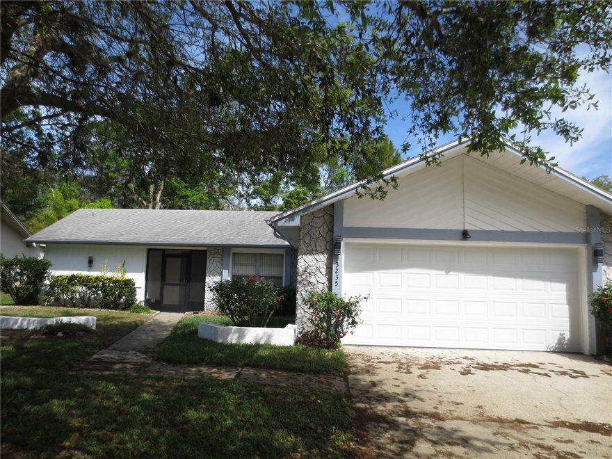 55+ community, Highland Lakes, offering tons of activities to include olympic sized pool, hot tub, no greens fee 27 hole golf course, bocce, tennis, shuffleboard, club house, auditorium, dinners & dances, wood shop, ceramics & art studio, RV & boat storage and access to Lake Tarpon. Large single family, one story, 2 bedroom, 2 bath, 2 car garage home. Features include newly remodeled eat in kitchen with granite countertops, newly remodeled master bathroom, new washer and dryer, new AC, new electrical panel, ceiling fans, rear screened porch and huge family room with no rear neighbors. Light fixtures being updated, carpets being professionally cleaned and house being converted to a 3 bedroom. Situated near schools, churches, shopping centers and major thoroughfares.