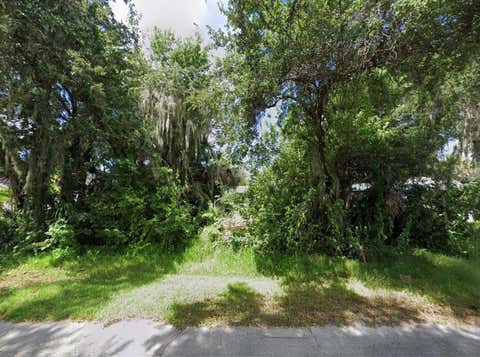 Photo of 1508 Sabal Palm Dr, Edgewater, FL 32132 (MLS # O6401584)