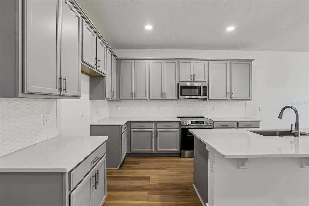 Photo of 31850 Clover Fin Court, Wesley Chapel, FL 33545 (MLS # TB8499365)
