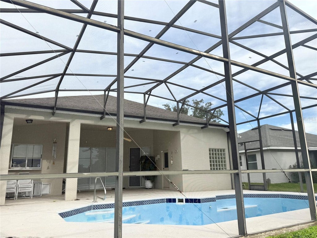 Photo of 1836 Everhart Drive, Orlando, FL 32806 (MLS # O6447911)