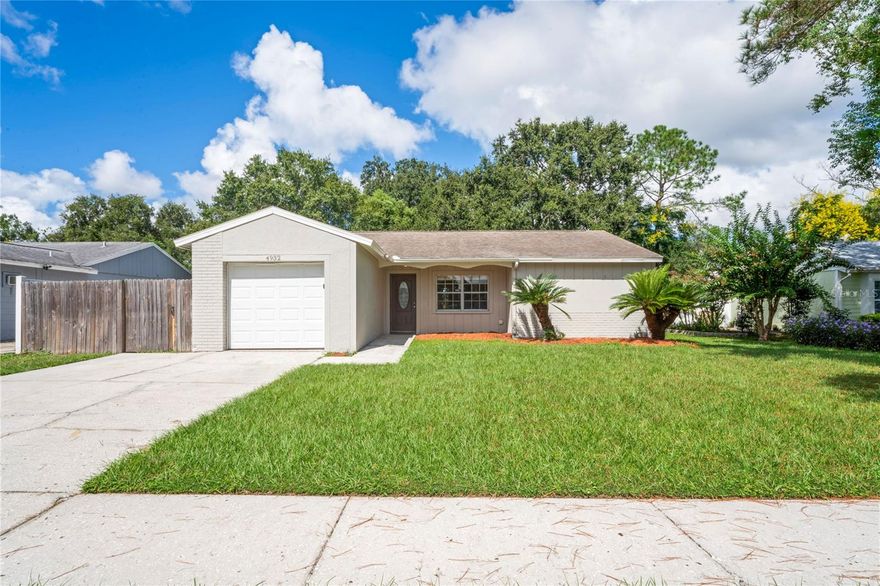 Welcome to 4932 Hi Vista Cir! This 3-bedroom, 2-bathroom home offers nearly 1,200 sq ft of living space. Step inside the foyer to find modern paint and tile throughout the home, for ease of maintenance. The layout features a spacious living room that connects seamlessly to the kitchen—complete with stainless steel appliances. The primary suite boasts a private en-suite bathroom, a walk-in closet,  and a walk-in shower, while two additional bedrooms share a full bath. The rear sliding glass door provides easy access to the fenced-in backyard featuring beautiful mature trees. Conveniently located near schools, shopping, and major roadways. Call to schedule a showing today!
