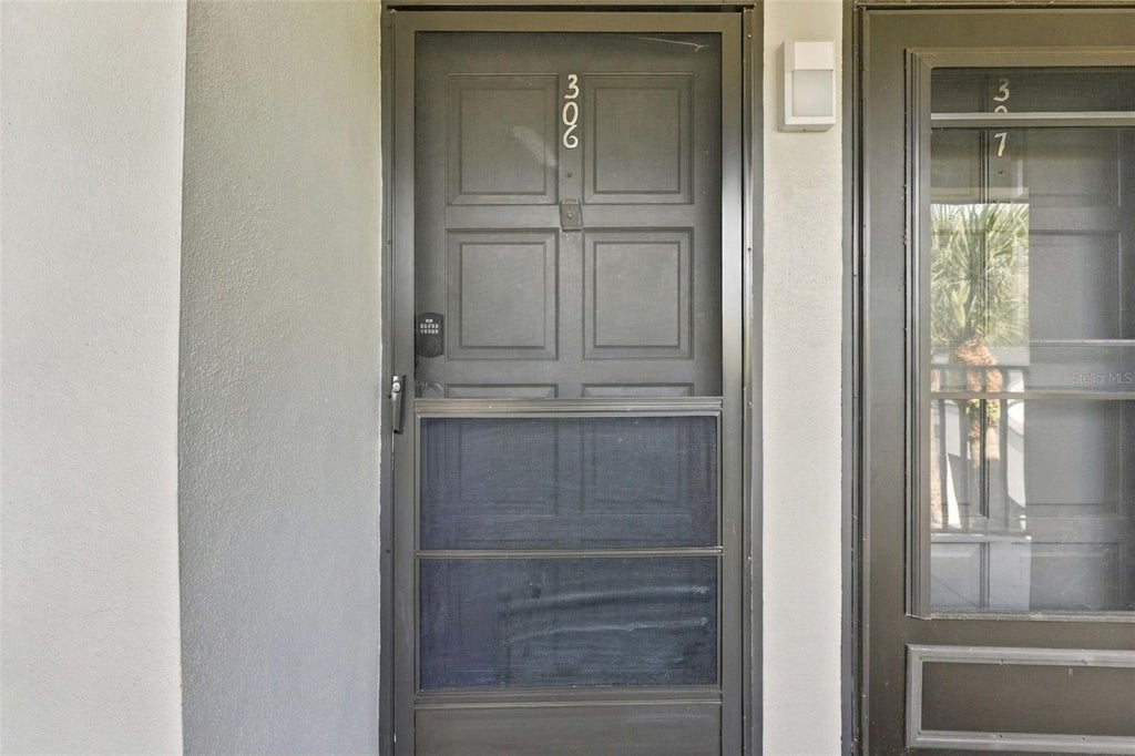 Photo of 2650 Countryside Boulevard #A306, Clearwater, FL 33761 (MLS # TB8559220)