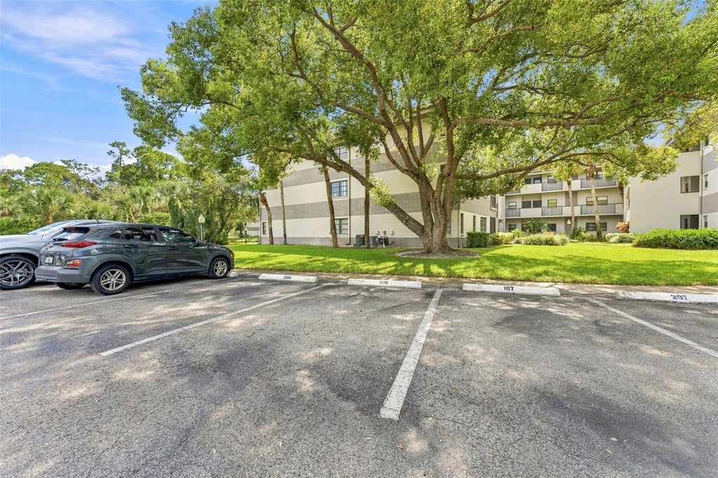 Photo of 2650 Countryside Boulevard #A306, Clearwater, FL 33761 (MLS # TB8559220)