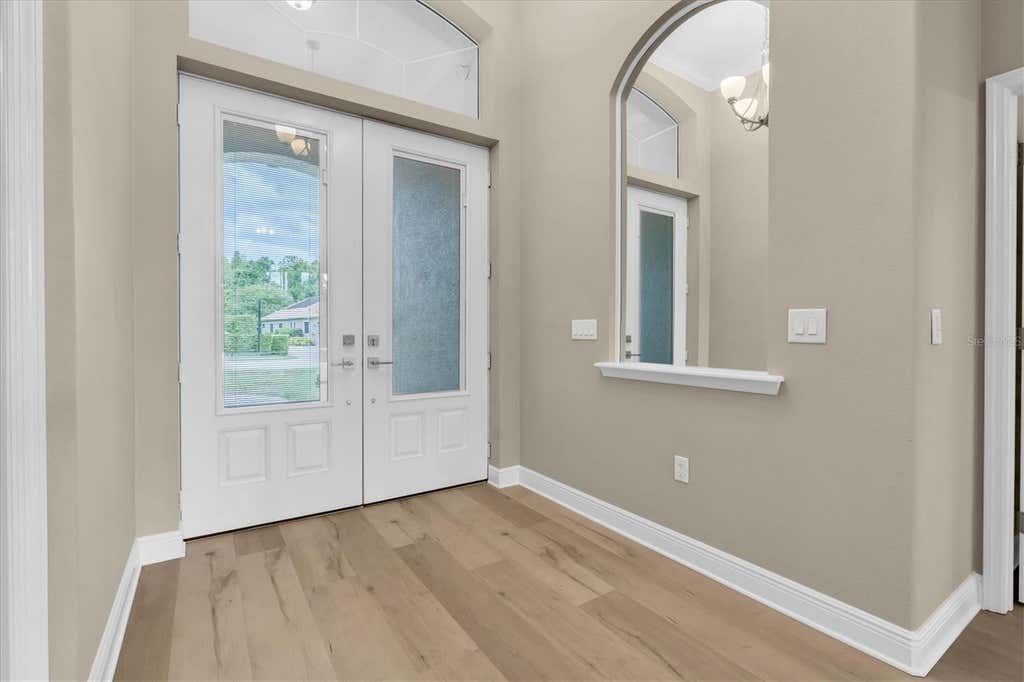 Photo of 1526 Lake Polo Drive, Odessa, FL 33556 (MLS # W7887453)