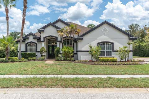 Photo of 1526 Lake Polo Drive, Odessa, FL 33556 (MLS # W7887453)