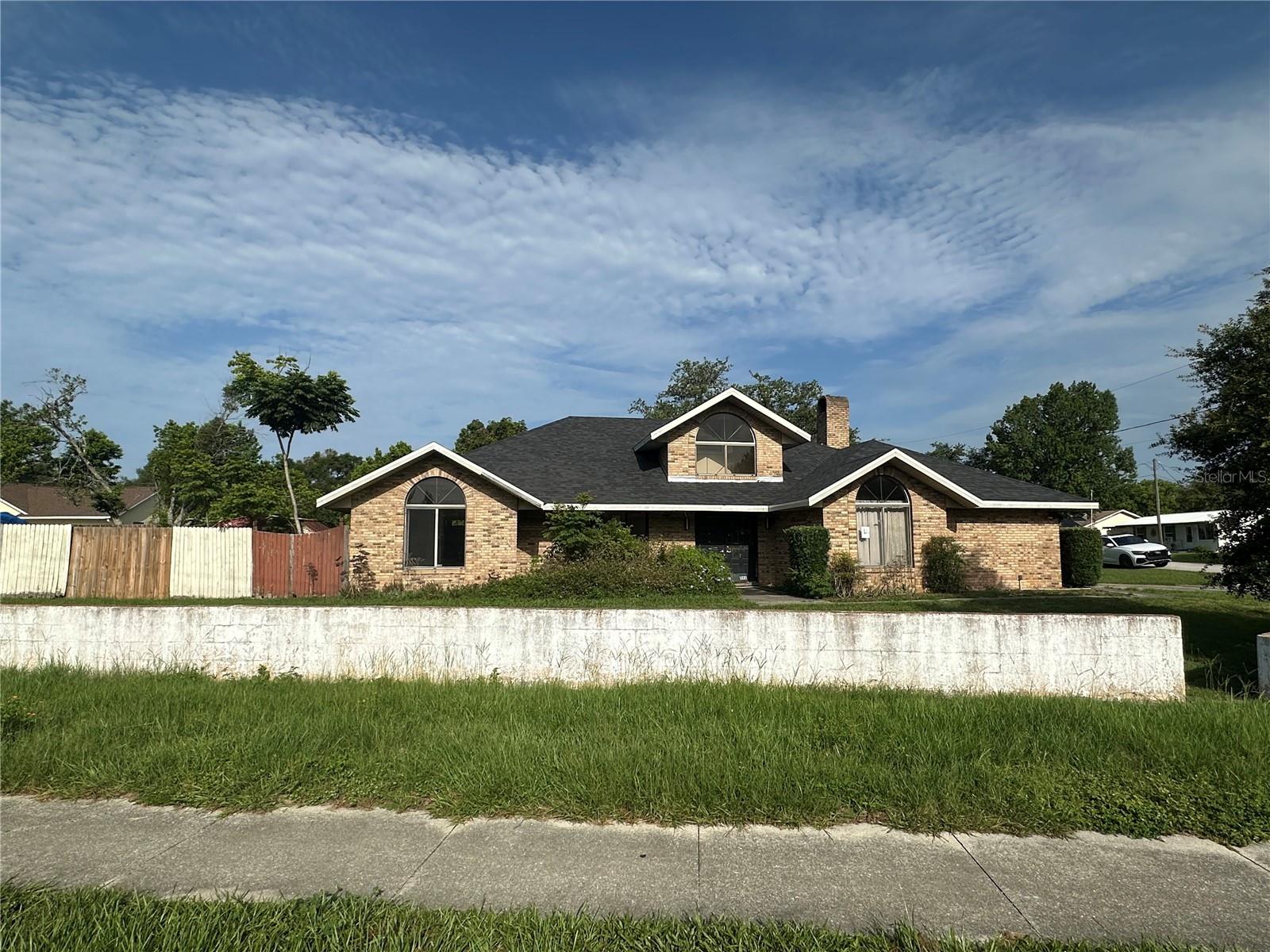 Great opportunity on this very large three bedroom 2 bath corner lot home sitting on 1/3 of an acre. It needs plenty of TLC but will be a charmer once complete. Split bedroom open floorplan. Large kitchen. Spacious rear patio. Oversized two car garage. No assignable contracts. Cash offers only. This one will not last.