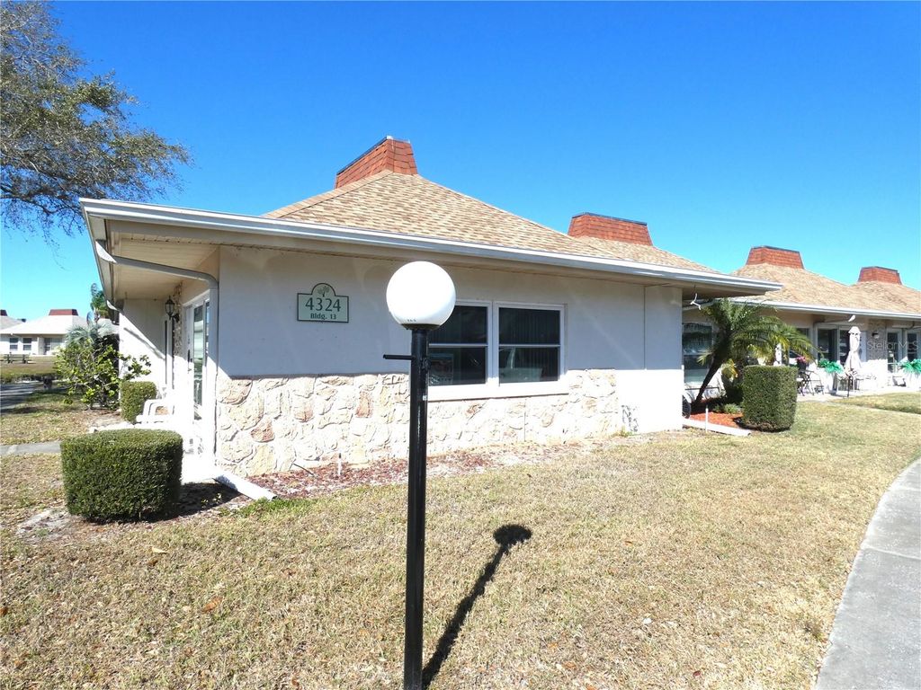 Photo of 4324 Tahitian Gardens Circle #A, Holiday, FL 34691 (MLS # W7882753)