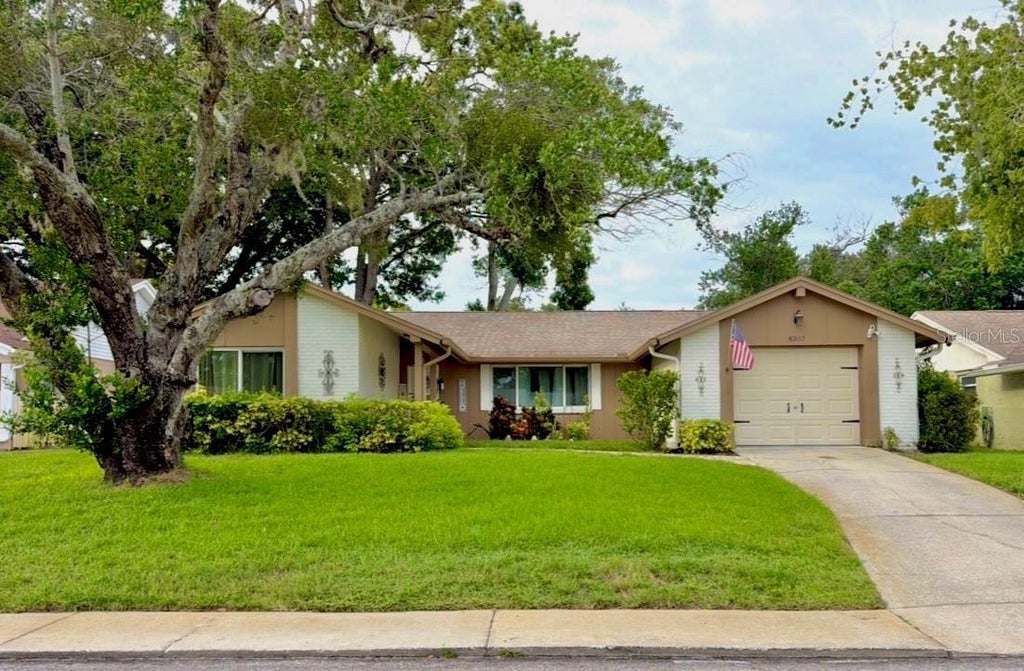 Photo of 8307 Mill Creek Lane, Hudson, FL 34667 (MLS # W7888881)