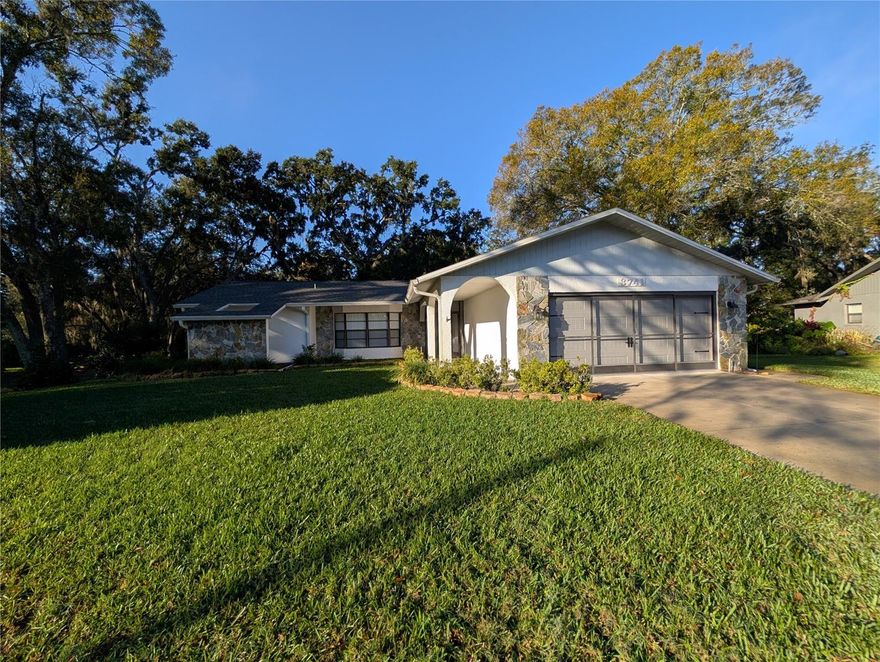 Tucked away at the end of a quiet cul-de-sac in the Greenbrook Estates community of New Port Richey, this charming 3-bedroom, 2-bath single-family home offers comfort, privacy, and a true sense of home. With no rear neighbors, you’ll enjoy peaceful views and added privacy, perfect for relaxing after a long day.

The home features brand-new flooring and fresh paint throughout, giving it a clean, updated feel. A spacious 2-car garage provides plenty of storage, while the functional layout makes everyday living easy and comfortable.

Residents enjoy access to the community pool and benefit from a desirable school zone. Lawn care and quarterly pest control are INCLUDED in rent, making maintenance a breeze.

Cozy, well-maintained, and ideally located, this home is ready for its next chapter.