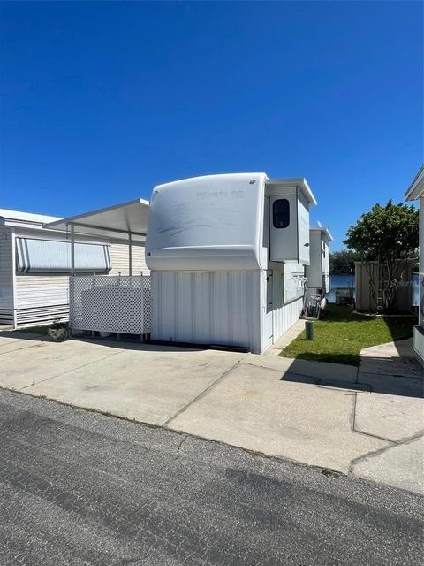 Photo of 86 Eagle Point S, Osteen, FL 32764 (MLS # O6288245)