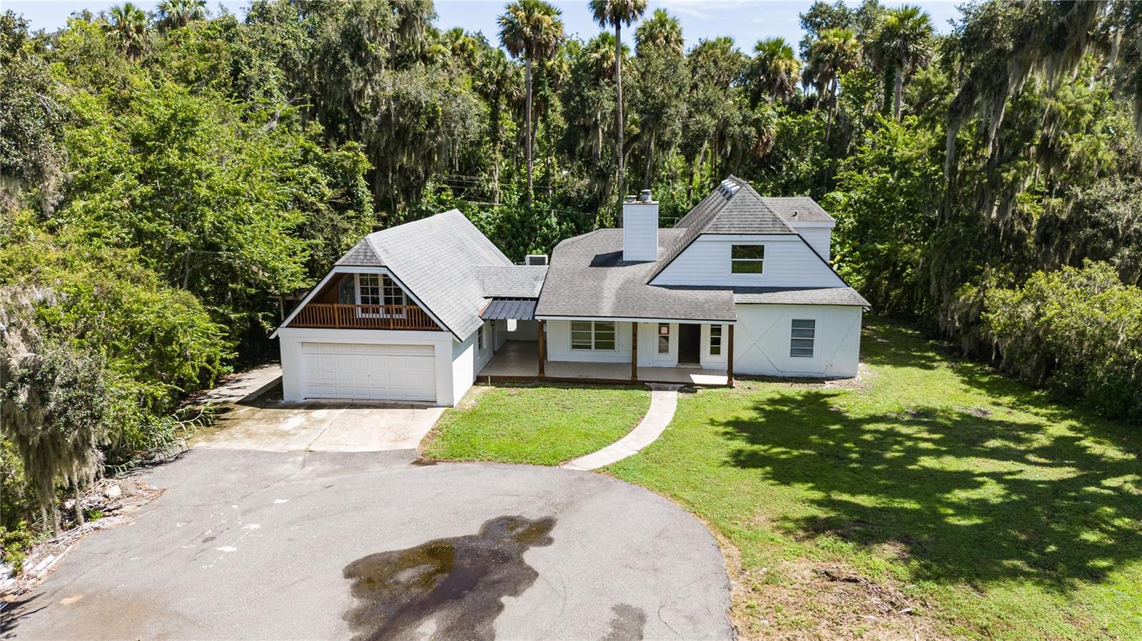 Beautiful Lake View Home with a Next Gen suite in Deltona – 20 Minutes from Sanford International Airport
Recently remodeled 4-bedroom, 3-bathroom in the primary home with panoramic lake views. The first floor offers 2 bedrooms and 2 full bathrooms. The second floor includes 2 additional bedrooms with a shared bathroom. Modern finishes throughout, including ceramic tile flooring in the entire home and quartz countertops in the kitchen and bathrooms.
Features a Next Gen suite with private entrance, living room, dining area, and bedroom with a full bath — perfect for multi-generational living or rental potential. Move-in ready and conveniently located near shopping, dining, and major highways.