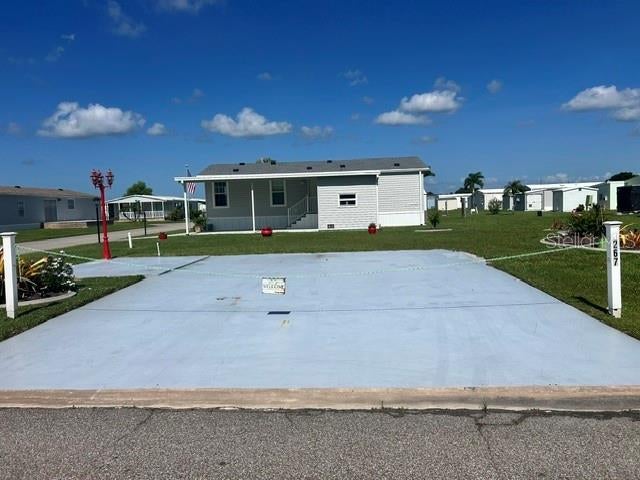 Photo of 267 Dolphin Pkwy, Punta Gorda, FL 33950 (MLS # C7528848)
