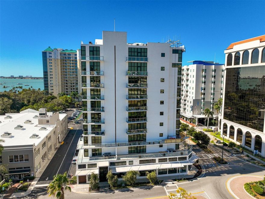 Welcome to luxury living at its finest in this spectacular 8th-floor residence located in the boutique Sansara building. Boasting 3 bedrooms, 3 bathrooms, and a prime downtown Sarasota location, this unit offers an unparalleled lifestyle in the heart of the city. Upon entering from the designer Lobby, you'll ascend to the 8th floor using one of two elevators, arriving at your private entry hall shared with only one other unit. Large double doors then welcome you into a bright and airy living space characterized by floor-to-ceiling windows that showcase picturesque views of Sarasota Bay and even extend to the Gulf of Mexico. The sleek and custom gourmet kitchen is a chef's dream, featuring Wolf and Subzero stainless steel appliances, finely appointed cabinetry with an extension for the wine fridge, built-in refrigerator, and espresso machine. The large island with one-of-a-kind countertops is perfect for both culinary endeavors and casual dining. Open the sliders the full width of the patio to add extra entertaining space offering a front row seat from your balcony to gorgeous sunsets, fireworks and other festivities taking place near the Marina or Bayfront Park. The primary bedroom is a luxurious retreat with dual built-in closets and an en-suite spa-like bath and a private balcony, offering a serene space to unwind. The secondary bedrooms also enjoy breathtaking views and share a well-appointed full bath. A versatile flex space with French doors opens up endless possibilities, whether you choose to use it as an office, library, or workout room. The Sansara residence is ideally situated, allowing you to explore the vibrant surroundings. Head to historic Burns Court with its cinema and galleries, or stroll down Main Street to discover an array of restaurants, shops, theaters, and the renowned Saturday Farmers Market. The marina and Bayfront Park are also within reach for outdoor enthusiasts. The building's amenities level enhances your living experience with a saltwater pool and spa, a shaded cabana for relaxation, an expertly appointed gym with scheduled private usage, a gas grill for outdoor cooking, and a cozy fire pit for socializing. Alternatively, savor the breathtaking sunset views from your own balcony as you toast to another fulfilling day in paradise. Indulge in the epitome of Sarasota living, where luxury, convenience, and style converge in this remarkable 8th-floor residence at Sansara.