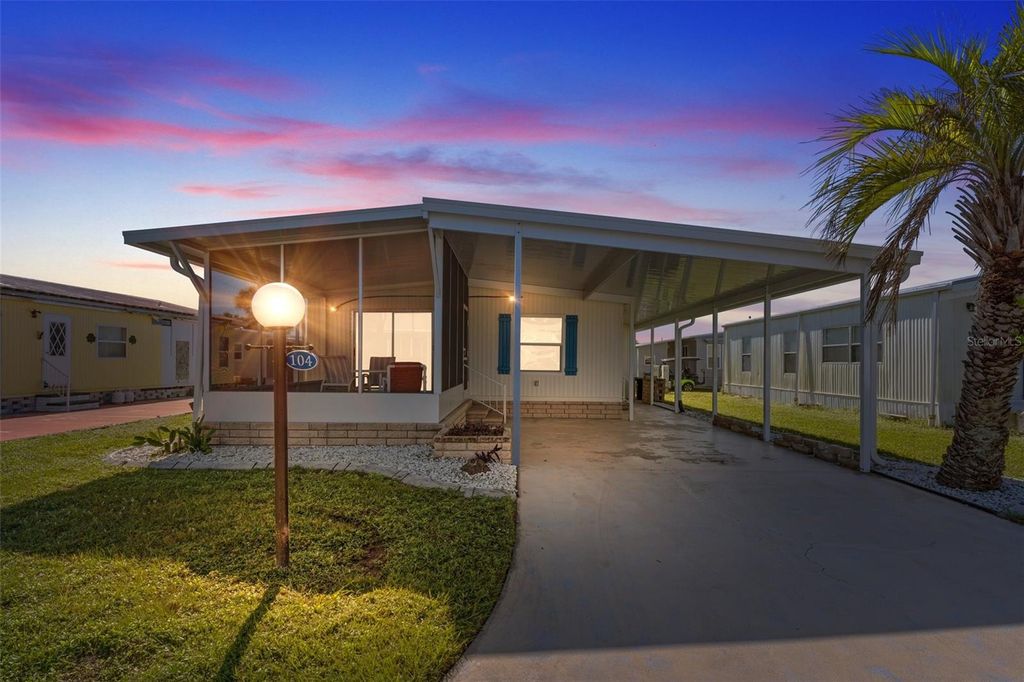 Photo of 104 Tobago Way, North Port, FL 34287 (MLS # C7515665)