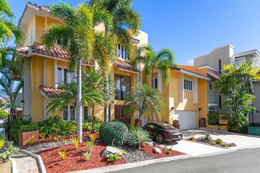 An Iconic Waterfront Residence in Isla San Marco, Palmas del Mar.
Nestled on the waterfront with a 90-foot private dock, this three-story masterpiece redefines luxury living. Step onto the open terrace, where sweeping views of the bay and passing yachts create the perfect backdrop for morning coffee, sunset cocktails, or elegant gatherings with friends and family.
The home features four spacious bedrooms, including a primary suite with a private balcony overlooking the bay and boats, offering a serene retreat at the end of the day. Maintain your wellness routine in a private, fully equipped gym, or enjoy cinematic experiences in a state-of-the-art theater with pristine acoustic sound.

The sparkling pool and Jacuzzi provide serene spaces to unwind, entertain, and fully embrace the waterfront lifestyle.
Currently generating $35,000 per month in rental income, this residence combines unparalleled luxury with an exceptional investment opportunity.
With only 40 exclusive residences in this enclave, enjoy unmatched privacy, prestige, and a truly elevated lifestyle reserved for those who appreciate the art of sophisticated living.