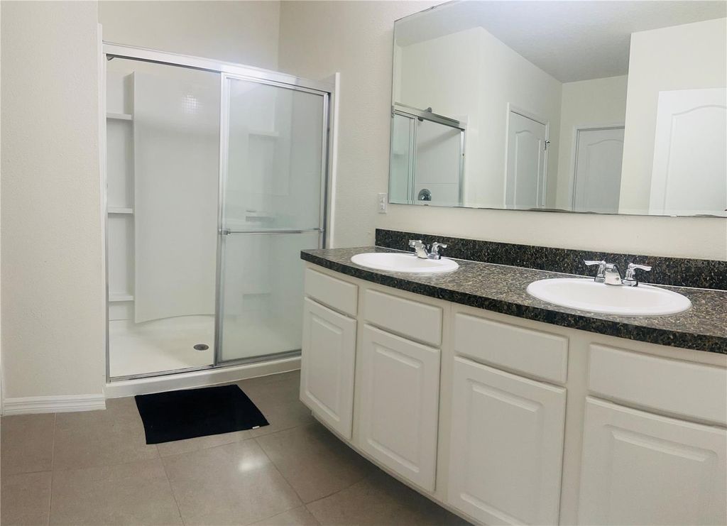 Photo of 102 Lake Tracy Court, Haines City, FL 33844 (MLS # O6332161)