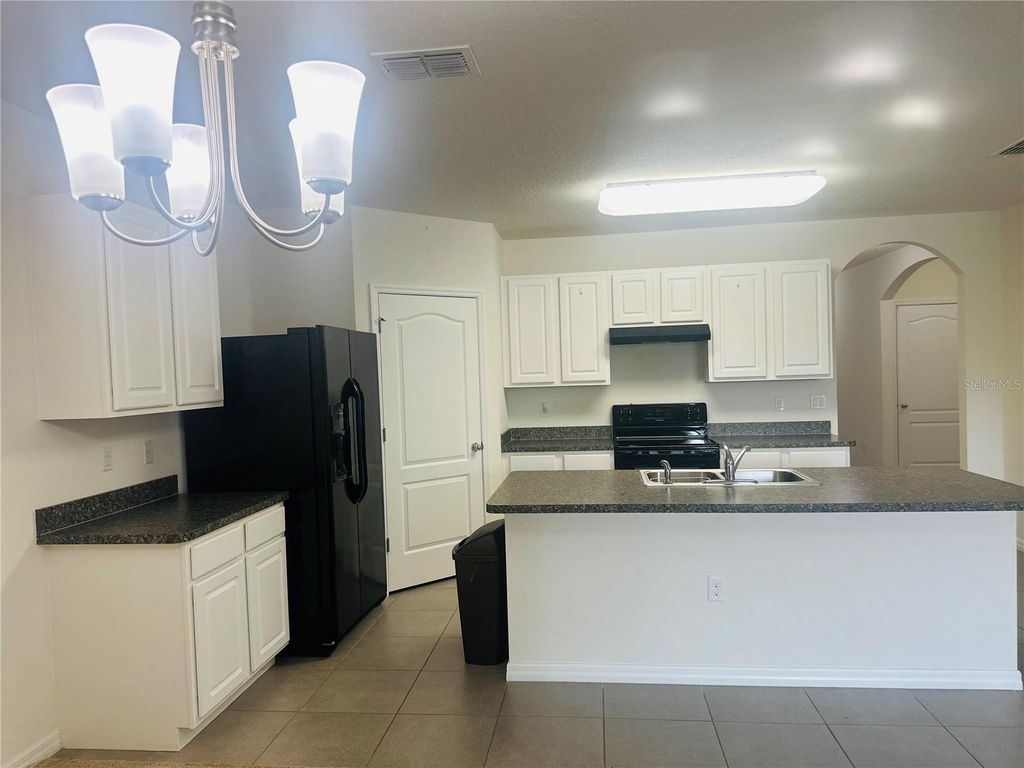 Photo of 102 Lake Tracy Court, Haines City, FL 33844 (MLS # O6332161)