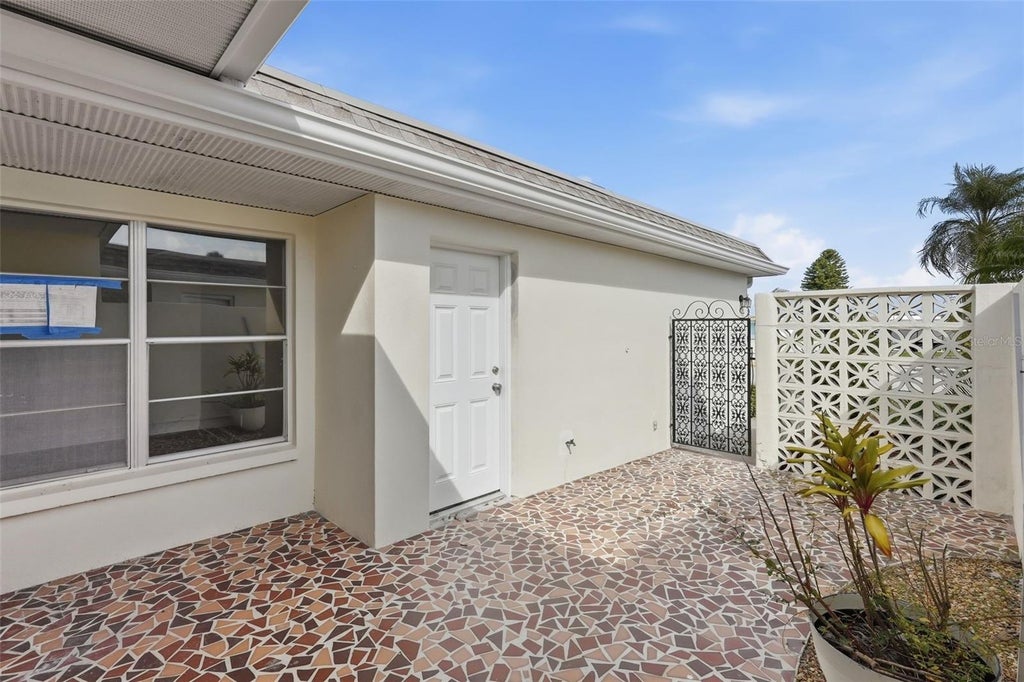 Photo of 280 Boca Ciega Point Boulevard S, St Petersburg, FL 33708 (MLS # TB8541867)