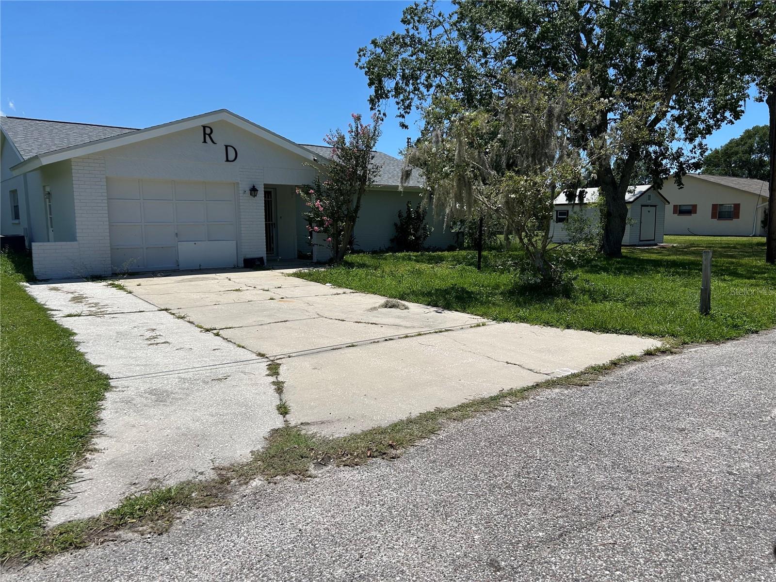 You can make it great again! This 2 bedroom, 2 bath, 1 car garage home was FLOOD DAMAGED and is located in the desirable Sea Pines area. It offers 1400 ft living area, an open floor plan, a spacious family room, a large back yard with an in-ground pool situated on a generous lot. This property is perfect for anyone wanting to make it their dream home, or investors ready to renovate. Much of the drywall has been removed- streamlining the restoration process. This is a unique opportunity. The home is being sold AS IS. Buyers are encouraged to conduct their own inspections and assessments.