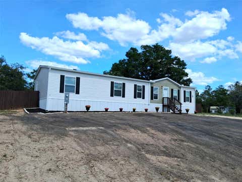 Photo of 8128 Weeping Willow Street, Brooksville, FL 34613 (MLS # TB8501607)