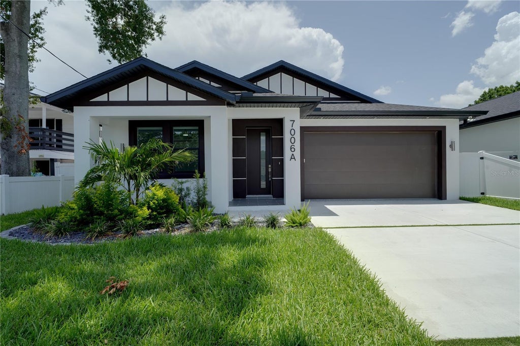 Photo of 7006 Thatcher Ave #A, Tampa, FL 33614 (MLS # TB8525737)