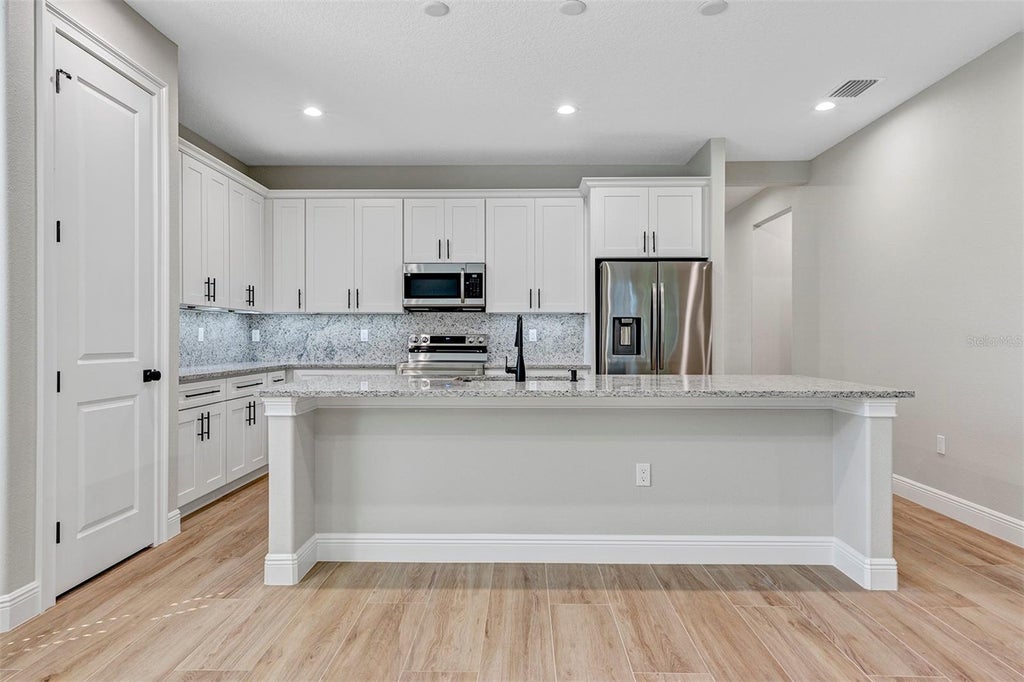 Photo of 13875 SE 53rd Terrace, Summerfield, FL 34491 (MLS # OM733964)