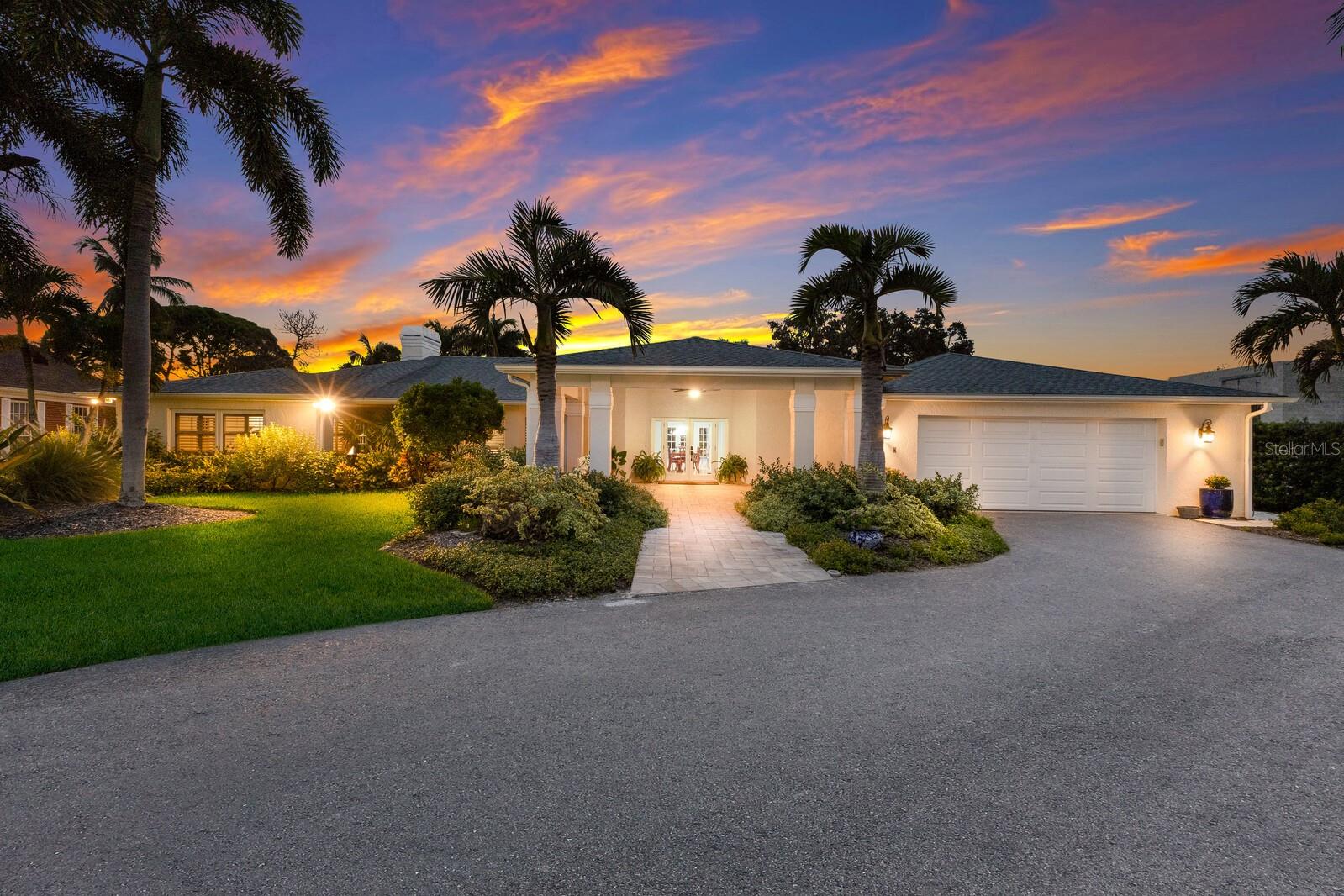 STUNNING WATERFRONT RETREAT ON WARNER’S BAYOU – 1.7 ACRES OF PRIVACY AND LUXURY! Discover the perfect blend of elegance and comfort with this incredible property—NO HOA, NO DEED RESTRICTIONS, and NO FLOOD INSURANCE REQUIRED! This remarkable home offers 4,400 sq. ft. of updated living space with 5 bedrooms, an office, four full baths, and two half baths, ideal for those seeking space and privacy. Arriving down the long, estate-style driveway, you’ll be greeted by an inviting entryway that sets the tone for this exceptional home. Inside, travertine floors flow through an open and functional floor plan. The formal dining room, with French doors leading to the newly renovated pool and patio, is ready for entertaining. The spacious living room, complete with a cozy fireplace and more French doors to the outside, creates a warm and welcoming atmosphere. Off the living room, the master suite awaits, offering ample space, a sitting area, built-in closets, and a beautifully updated bathroom with his and her vanities, a stunning clawfoot soaking tub, and a large steam shower. Nearby, a dedicated office with wood floors and a closet provides an ideal workspace. The kitchen is a true highlight, featuring striking granite countertops, solid wood cabinetry, high-end stainless steel appliances including a Wolf gas cooktop, wine cooler, and icemaker, a central island, and a large breakfast bar—perfect for cooking, entertaining, or casual dining. The kitchen seamlessly flows into the family room, which has an additional wood-burning fireplace, making it a great spot for relaxed gatherings. The split bedroom design includes four additional bedrooms and three and a half baths on the opposite side of the home. Two bedrooms share a Jack and Jill bath, while a third is en-suite, providing flexibility for family or guests. French doors throughout the main living areas allow for easy access to the outdoor spaces. Step outside to your own private oasis with a large pool, covered seating areas, outdoor half bath and a summer kitchen that truly feels like a resort. The expansive backyard extends down to a private dock on Belair Bayou, offering direct access to Warner’s Bayou, the Manatee River, and the Gulf of Mexico—perfect for boating, fishing, and enjoying Florida’s waterfront lifestyle.Beyond its luxurious amenities, this home boasts an unbeatable location. Warner's West Bayou is one of the most desired bodies of water in Manatee County with its protected waterway and a high bridge that allows for larger boats. You will find tons of watersport activities happening on any given weekend on the bayou.. from families pulling their kids on the wakeboard, people on kayaks or paddleboards, or others simply enjoying time on their docks watching the sunsets. TRULY A MAGICAL PLACE!!! Just minutes from the pristine beaches of Anna Maria Island, and a short drive to downtown St. Pete and Sarasota’s vibrant cultural and culinary scenes. Plus, enjoy easy access to IMG ACADEMY and the nearby Robinson Preserve, a 682-acre nature preserve with trails, kayak launches, scenic lookouts, and picnic areas. Don’t miss this opportunity to experience the epitome of the Florida waterfront living! Schedule your showing today!