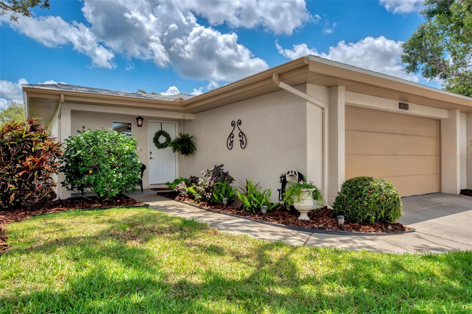 Absolutely Move-In-Ready. Shows like a Designer Model. Enjoy this completely remodeled 2 bedroom, 2 Bath villa that showcases a formal Living Room, Formal Dining Room and Great Room along with a Gourmet Kitchen. The chef in your life will appreciate the unique features such as a stove pot filler, apron sink, solid surface counters, subway tile backsplash, LED light fixtures, newer appliances, excluding refrigerator, soft close cabinets and much more. Bathrooms are as tastefully updated as the kitchen. The large, air conditioned lanai/Florida room offers a private and tranquil view with immediate access to the community pool. New roof in 2023. New water heater in 2019. New AC in 2015.
The Association will be painting the exterior in the next few months. Live maintenance free and enjoy this Central Sarasota location. Just minutes from fine dining, Doctors, Hospitals, Siesta Key Beach, Legacy Trail, I-75 and the plethora of cultural amenities Downtown Sarasota has to offer.