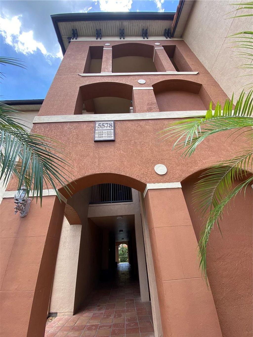 Photo of 6141 Metrowest Boulevard #308, Orlando, FL 32835 (MLS # O6392995)