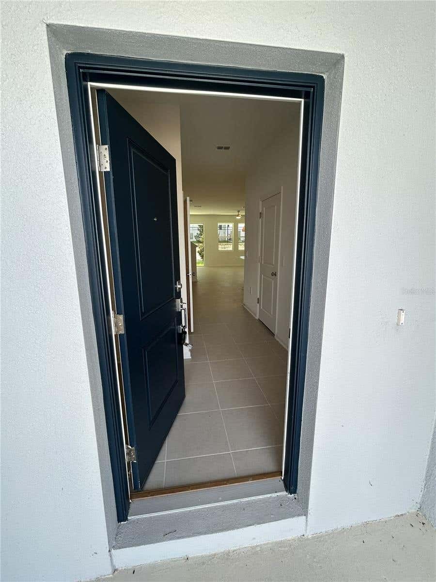 Photo of 3111 Kurtz Ter, Davenport, FL 33837 (MLS # O6417593)