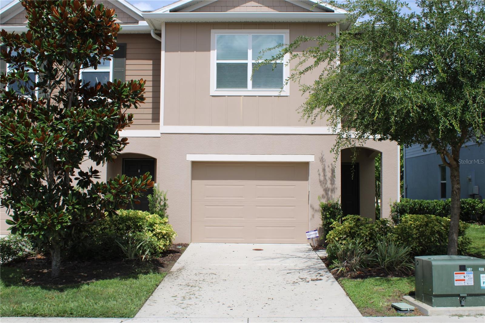 Discover the perfect blend of modern comfort and unbeatable convenience in this stunning, like-new 3-bedroom, 2.5-bath townhome nestled in the beautifully maintained Live Oak Hills community of Lakeview Village, Tampa. Step into a bright, open-concept living area ideal for relaxing or entertaining, complemented by a smart floor plan featuring a convenient half bath on the main floor, a Jack and Jill bathroom connecting two upstairs bedrooms, and a private master suite with a walk-in closet and en-suite bathroom. Enjoy the ease of an upstairs laundry room with washer and dryer included, an attached 1-car garage with extra driveway parking, and lush green spaces right outside your back door, with lawn care handled by the HOA. Perfectly positioned near I-4, I-75, and the Selmon Expressway, this immaculate home offers quick access to Hard Rock Hotel & Casino, Florida State Fairgrounds, MidFlorida Credit Union Amphitheatre, and vibrant destinations like Brandon, Ybor City, and Downtown Tampa—all under 20 minutes away. Move into this fresh, stylish townhome and experience Tampa living at its finest!