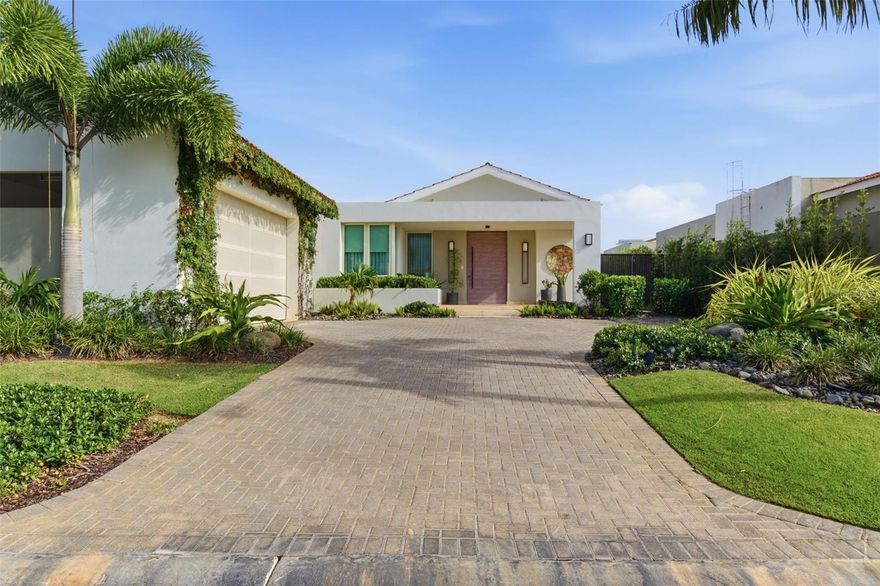 Located in the desirable Isla Norte area, this stunning newer-construction residence offers refined modern living with exceptional privacy and serene natural surroundings. Built in 2023, the home spans approximately 5,100 square feet of interior living space, not including the expansive terrace and landscaped backyard, and is thoughtfully designed for both elegant entertaining and everyday comfort.

The residence features four bedrooms, including three spacious ensuite bedrooms, plus a versatile fourth room ideal for a home office, guest room, or den. In total, the home offers four full bathrooms and two half bathrooms, one of which is a unique outdoor bath, seamlessly blending indoor and outdoor living.

The backyard is a true retreat, showcasing a private pool, a beautifully finished terrace, lush mature landscaping, and a dedicated outdoor grill and entertainment area. With open views of protected greenery and the natural landscape of Sabanera, the property enjoys exceptional tranquility, minimal neighboring homes, and an elevated sense of privacy, perfect for hosting gatherings or relaxing in a peaceful setting.

The home is beautifully furnished by interior decorators and is offered fully furnished, excluding artwork and select vintage pieces. Additional features include a covered attached garage, modern finishes throughout, and a seamless layout that maximizes light, flow, and connection to nature.

Residents enjoy access to the amenities of Sabanera Dorado, including club access, fitness facilities, walking trails, and 24/7 security, as well as proximity to the renowned TASIS School.