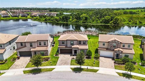 Photo of 156 Kenny Boulevard, Haines City, FL 33844 (MLS # O6328407)