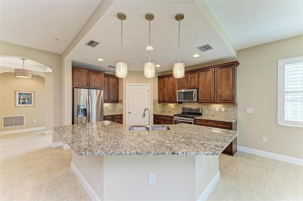 Photo of 7546 Divot Loop, Lakewood Ranch, FL 34202 (MLS # A4665267)