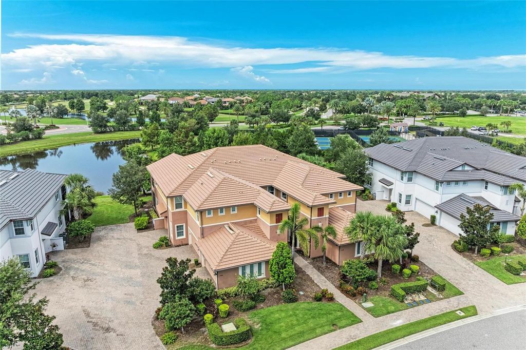 Photo of 7546 Divot Loop, Lakewood Ranch, FL 34202 (MLS # A4665267)