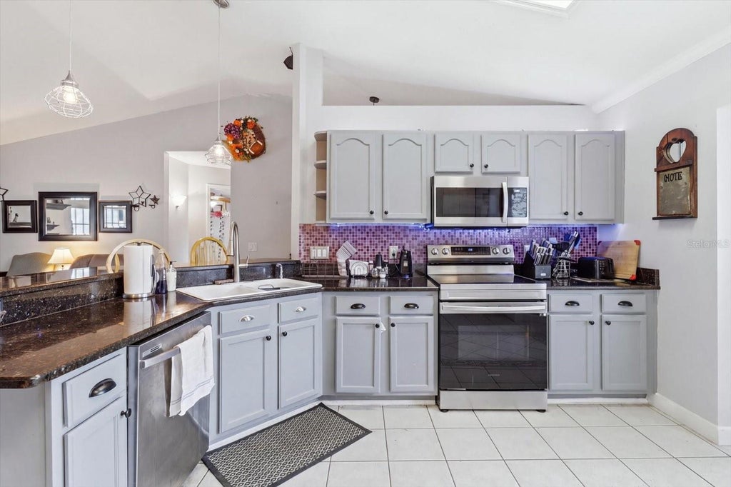 Photo of 13525 SW 43rd Circle, Ocala, FL 34473 (MLS # OM731700)
