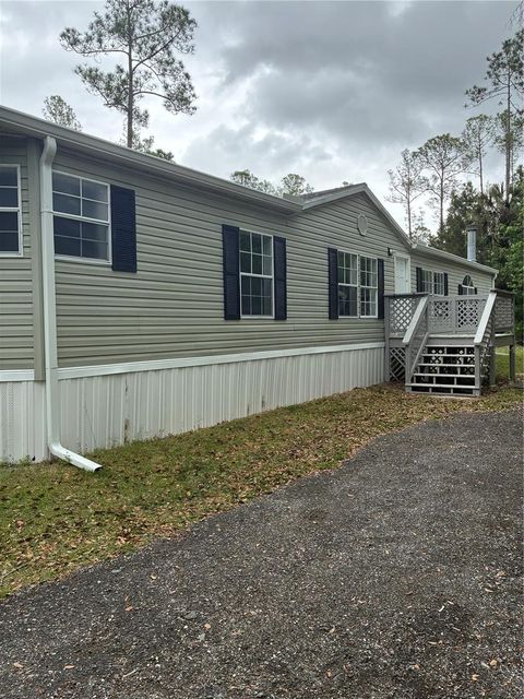 Photo of 3150 W Cr 2006, Bunnell, FL 32110 (MLS # FC317403)