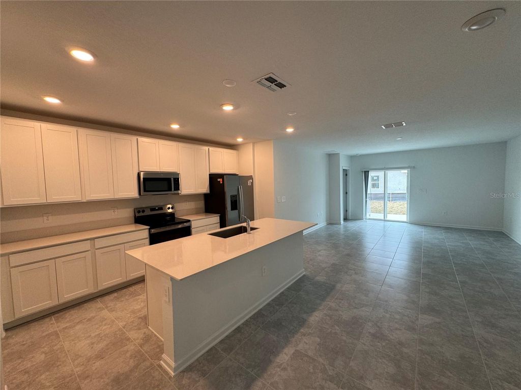 Photo of 2154 Aquifer Lane, Davenport, FL 33837 (MLS # O6405481)
